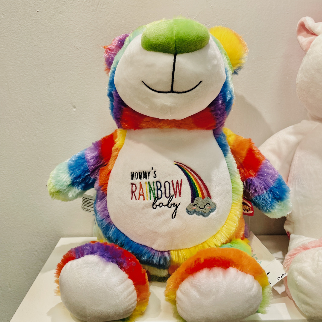 Keep your rainbow baby close to your heart with this soft and cuddly teddy bear. We will embroider the name of your choice on his belly. Can also include the embroi