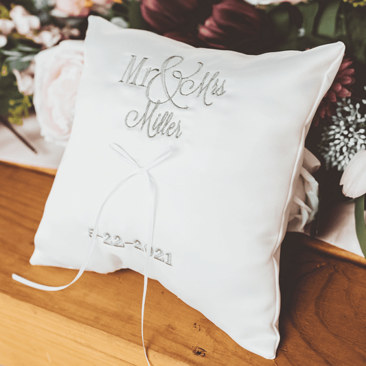Looking for an elegant and personalized accessory for your wedding ceremony? Look no further than our custom embroidered wedding ring pillow! Made with high-quality