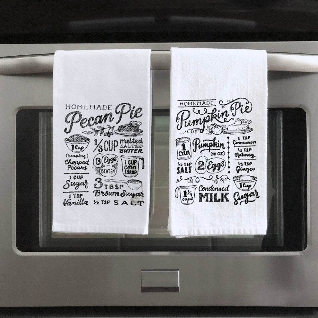 Decorate your kitchen and bring some traditional charm to your Thanksgiving table with this beautiful flour sack towel. It features a vintage look, with decorative s
