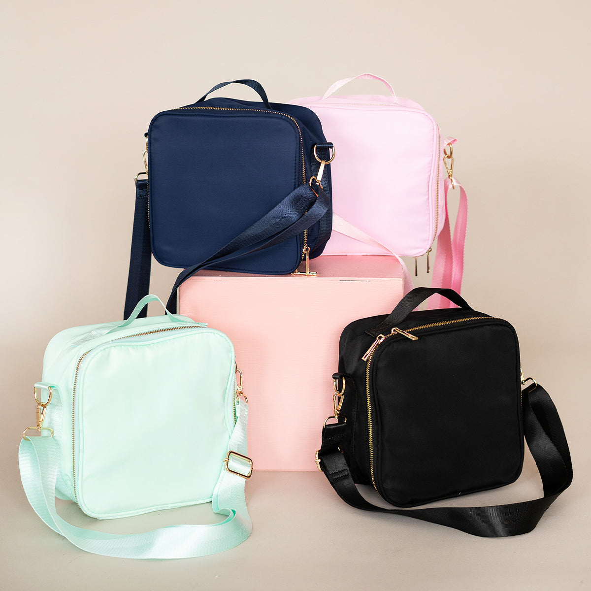 4 nylon lunchboxes. navy, pink, mint, black