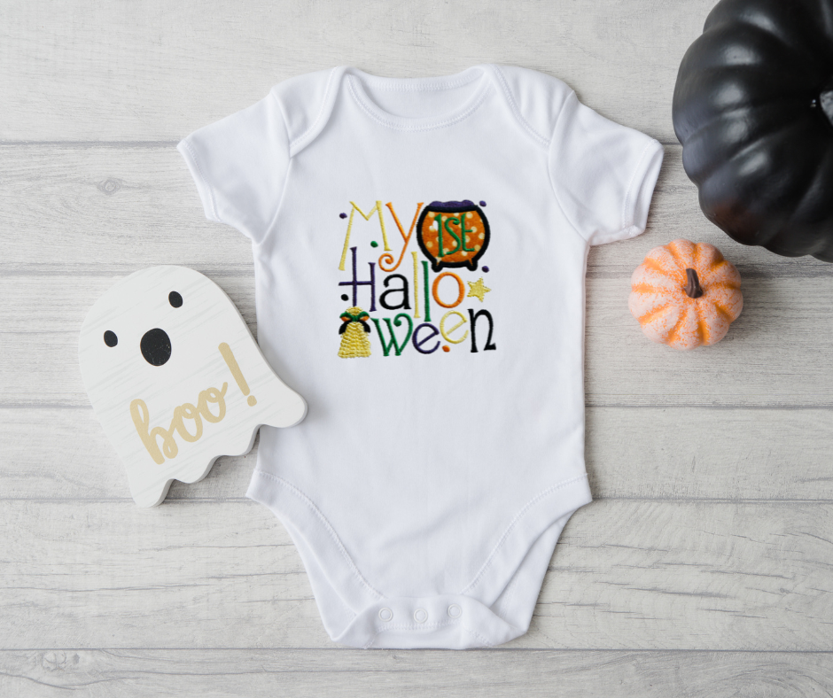My First Halloween Onesie® with short sleeves. Featuring a cauldron. All text is embroidered on Onesie®.