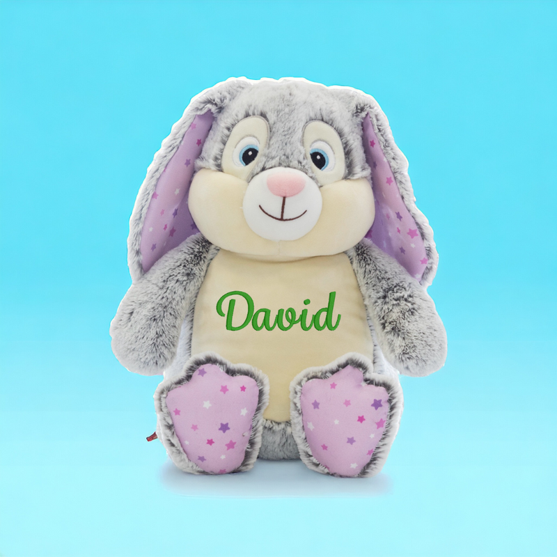 
Welcome the joy of Easter with our delightful Personalized Purple Embroidered Easter Bunny! Standing tall at 18 inches, this cuddly companion is a charming addition