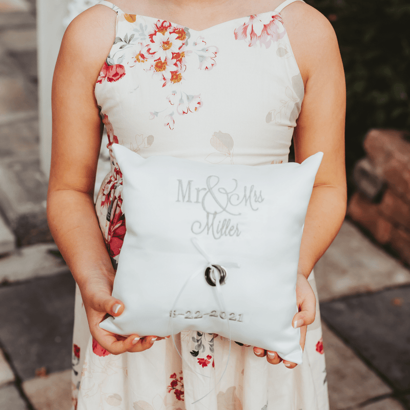 Looking for an elegant and personalized accessory for your wedding ceremony? Look no further than our custom embroidered wedding ring pillow! Made with high-quality 