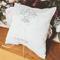 Looking for an elegant and personalized accessory for your wedding ceremony? Look no further than our custom embroidered wedding ring pillow! Made with high-quality 