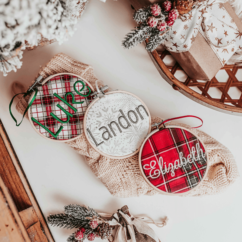 Add a touch of elegance to your Christmas decor with these personalized Christmas stocking tags. Each tag is in a bamboo embroidery hoop with a satin ribbon for hang