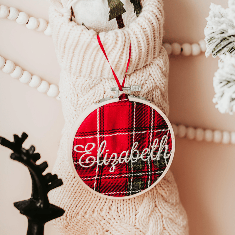 Add a touch of elegance to your Christmas decor with these personalized Christmas stocking tags. Each tag is in a bamboo embroidery hoop with a satin ribbon for hang