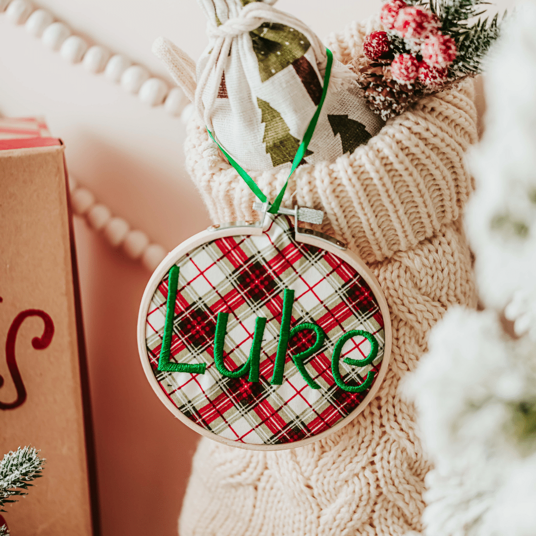 Add a touch of elegance to your Christmas decor with these personalized Christmas stocking tags. Each tag is in a bamboo embroidery hoop with a satin ribbon for hang
