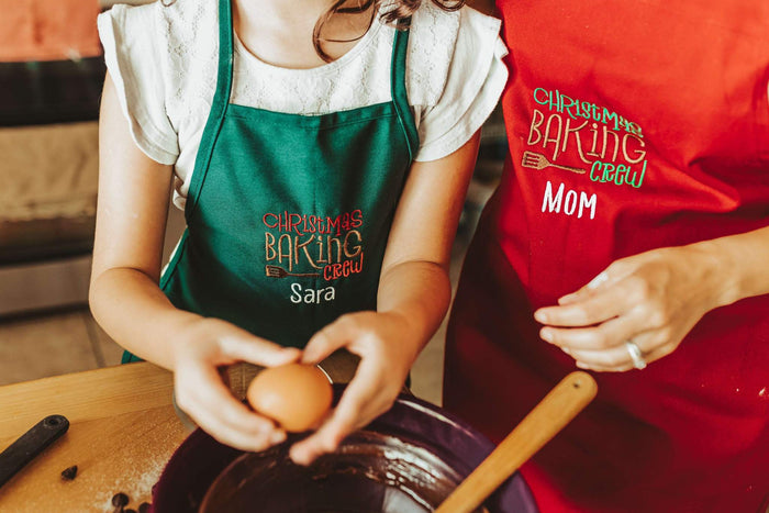Baking Christmas cookies is a magical time. So much fun and memories made in the kitchen. Make those moments even more special with matching Christmas aprons. Each s
