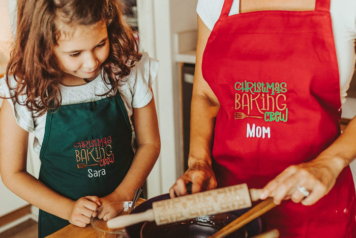 Baking Christmas cookies is a magical time. So much fun and memories made in the kitchen. Make those moments even more special with matching Christmas aprons. Each s