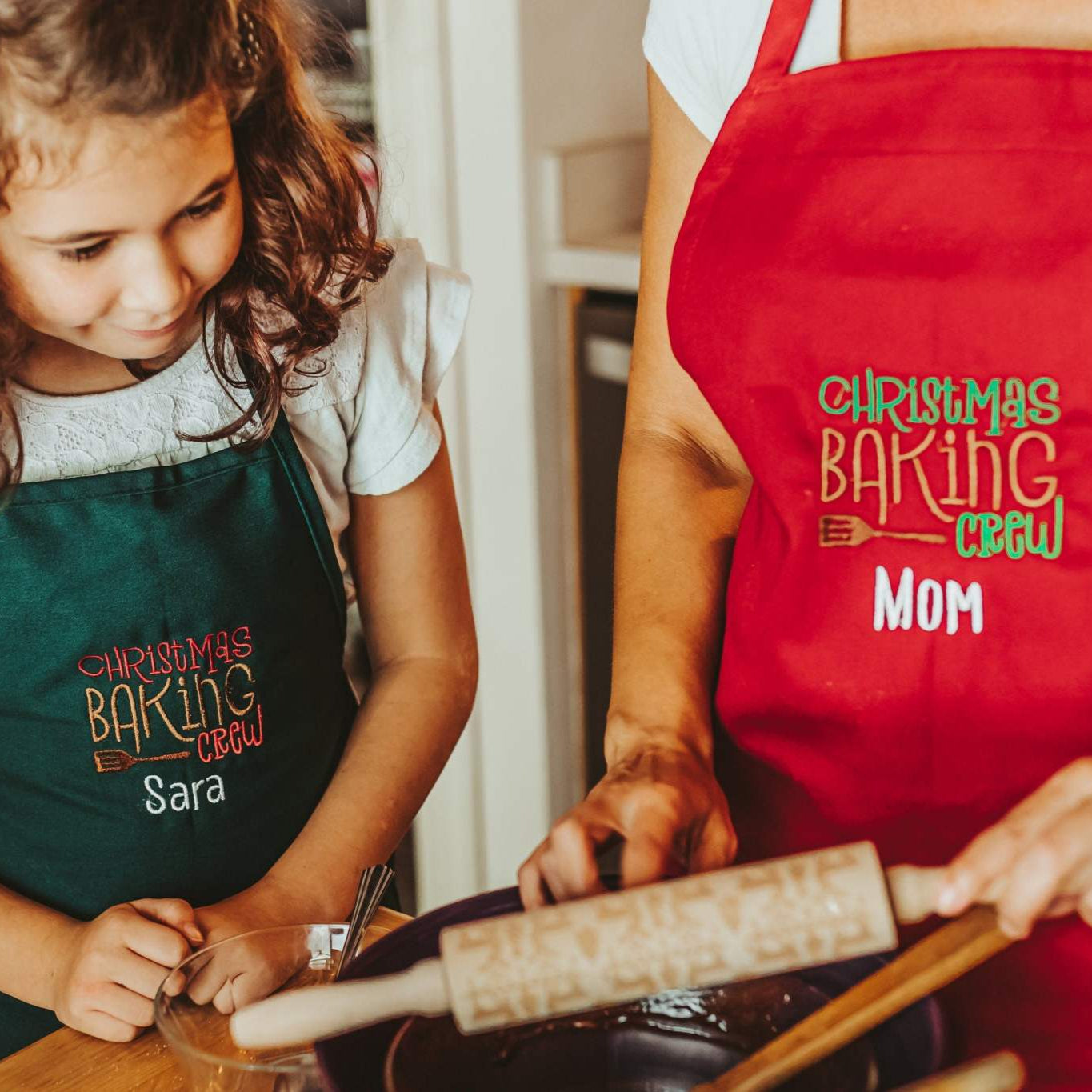 Baking Christmas cookies is a magical time. So much fun and memories made in the kitchen. Make those moments even more special with matching Christmas aprons. Each s