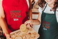 Baking Christmas cookies is a magical time. So much fun and memories made in the kitchen. Make those moments even more special with matching Christmas aprons. Each s