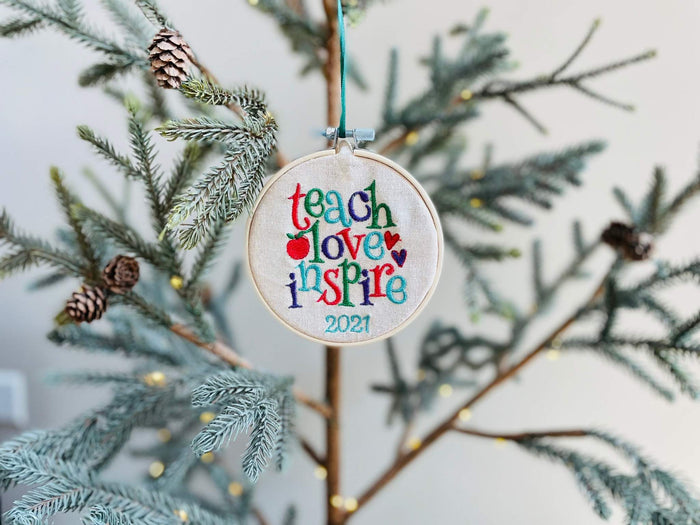 Christmas ornaments are the perfect gift for your favorite teacher. This ornament is machine embroidered. Features a wooden embroidery hoop. You can use this ornamen