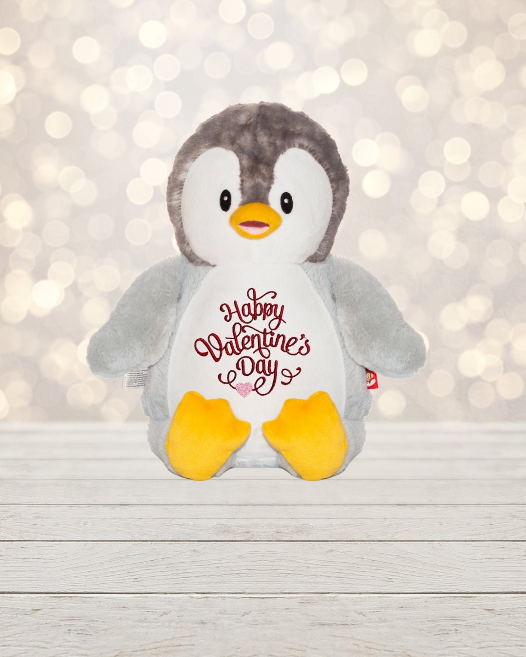 Love is in the air! Surprise your special someone with a cute penguin for Valentine's Day. This 18 inch tall Gray Penguin is soft, plush and ready to show how much y