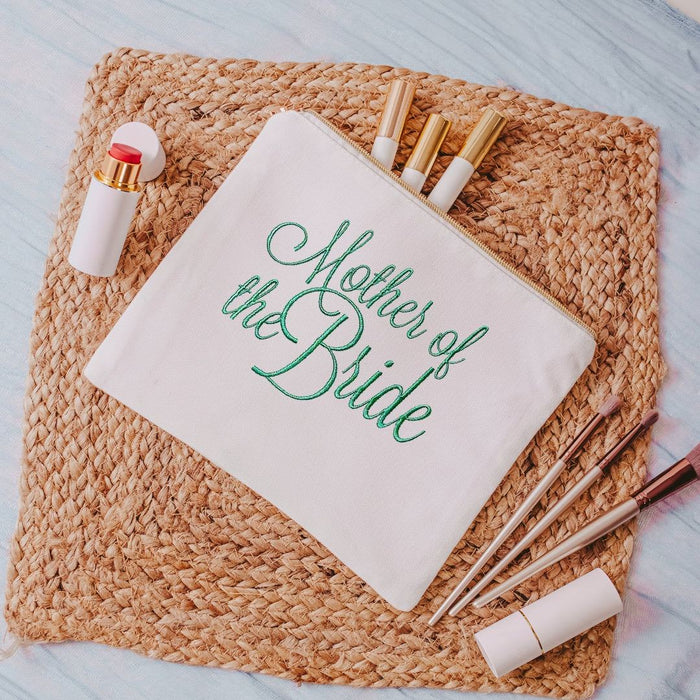 This white canvas makeup bag is a must-have accessory for any mother of the bride. Measuring 10.5" x 8" x 1", it's the perfect size to hold all of your makeup essent