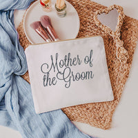 This white canvas makeup bag is a must-have accessory for any mother of the groom. Measuring 10.5" x 8" x 1", it's the perfect size to hold all of your makeup essent