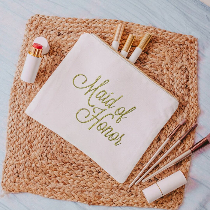 This white canvas makeup bag is a must-have accessory for any maid of honor. Measuring 10.5" x 8" x 1", it's the perfect size to hold all of your makeup essentials, 