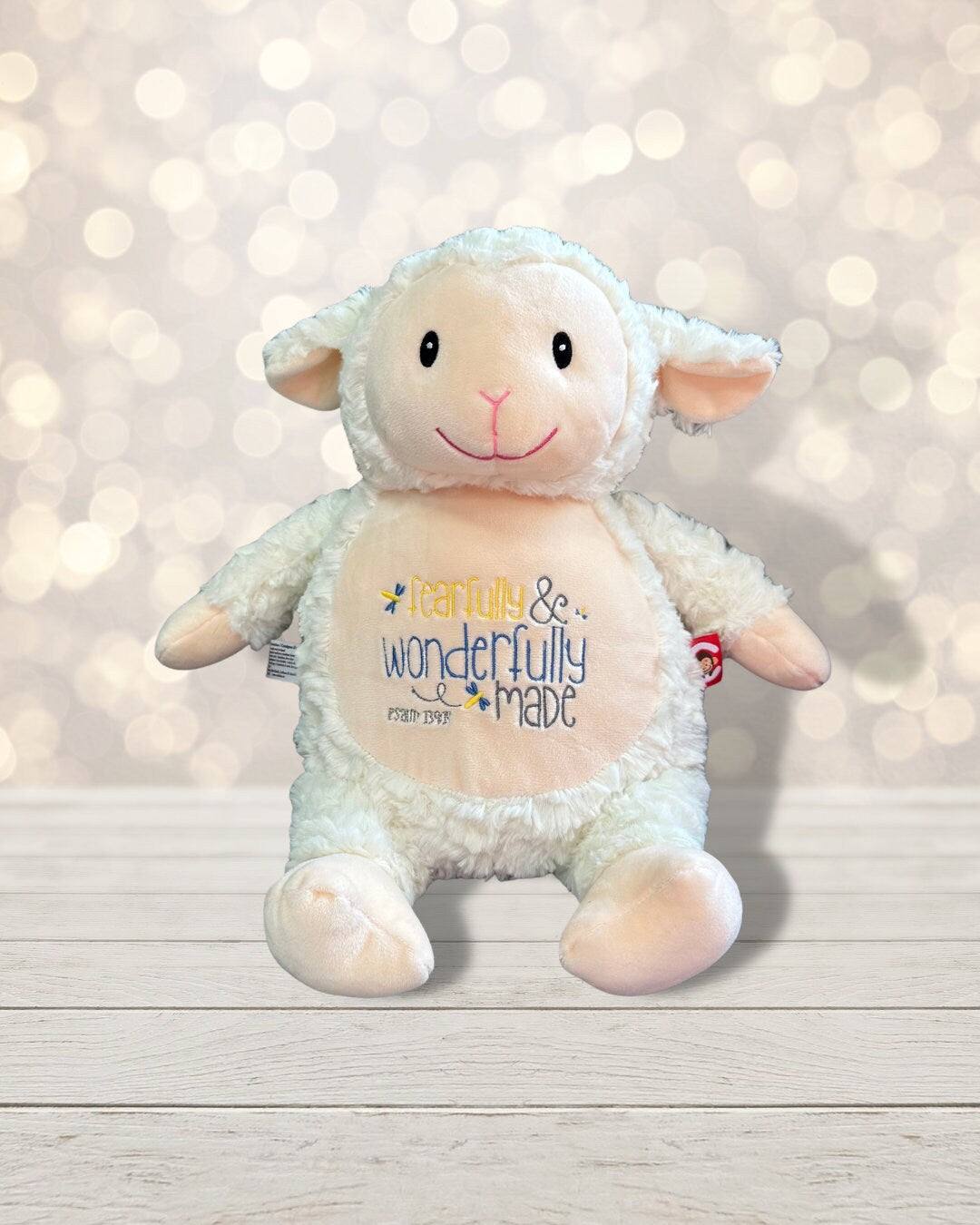 This 18 inch plush lamb is made from soft and cuddly materials, making it the perfect companion for children and adults alike. The lamb features an embroidered messa