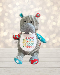 Introducing our 18 inch tall plush hippo, the perfect addition to any child's stuffed animal collection. This adorable hippo features an embroidered message on its b