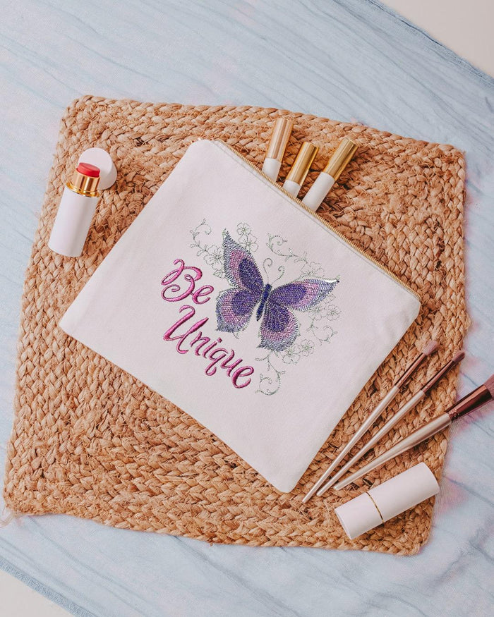  










The white canvas cosmetic bag is a stylish and practical accessory for women and girls on the go. Measuring 10.5 inches by 8 inches by 1 inch, it offers 