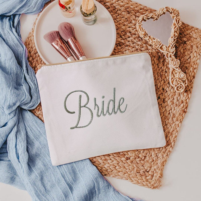 Introducing our beautifully crafted canvas cosmetic bag, perfect for any bride-to-be! The bag is made of sturdy canvas material, ensuring it will last through all th